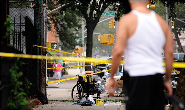A murder scene at Gates Avenue and Patchen Avenue in Bedford-Styuvesant, Brooklyn, in July 2008. Robert Stolarik for The New York Times.